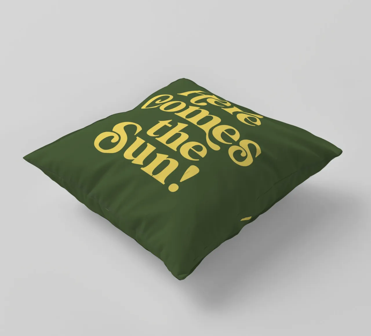 Here Comes the Sun Typography Print in Green and Yellow decorative cushion by THE MOTIVATED TYPE