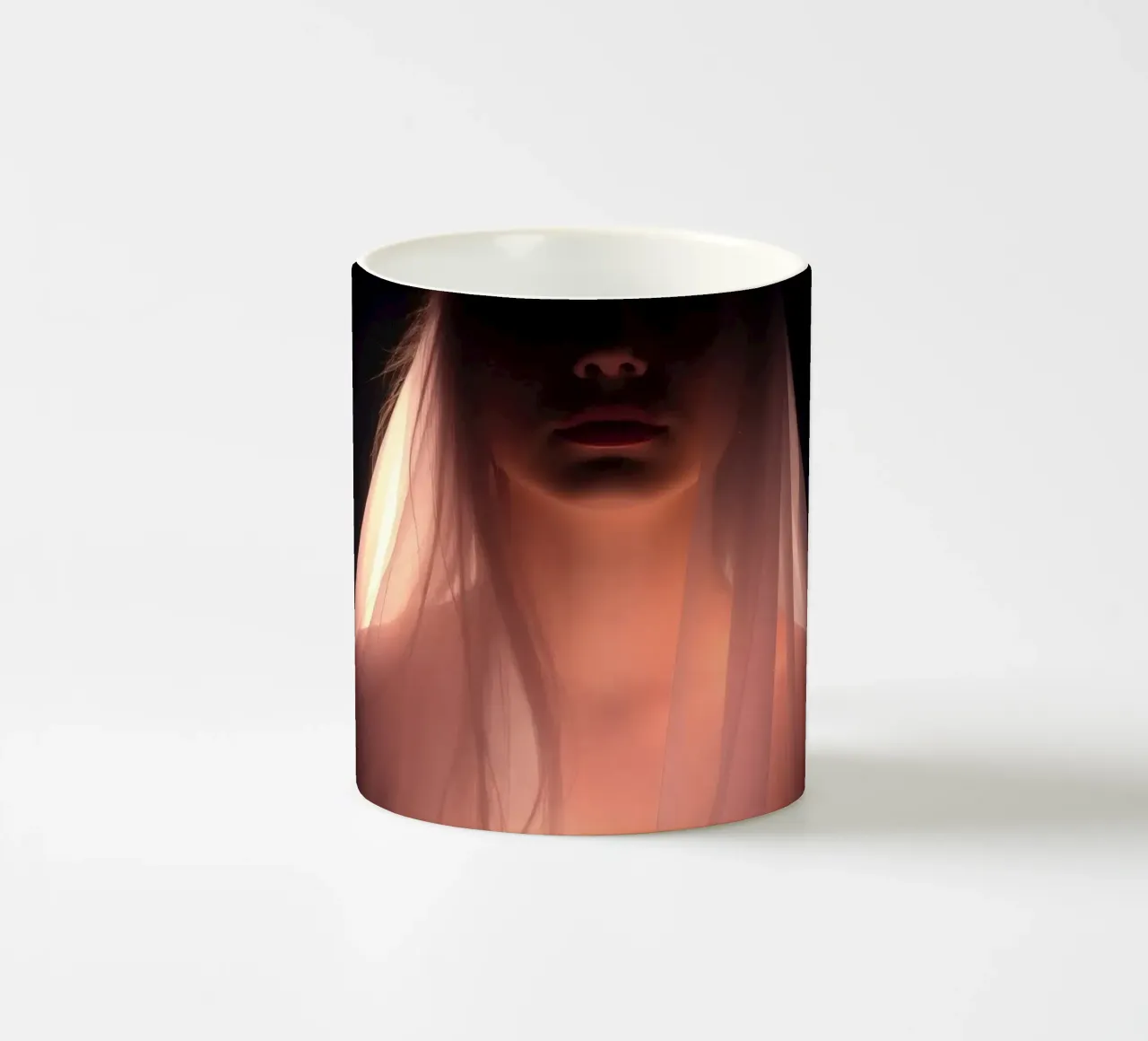 figure with a veil illuminated from below in a dark space ceramic mug by DesignDoodle