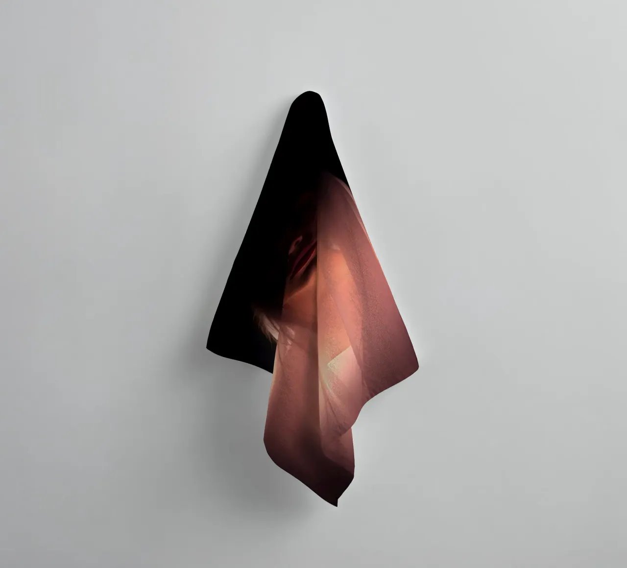 figure with a veil illuminated from below in a dark space towel by DesignDoodle