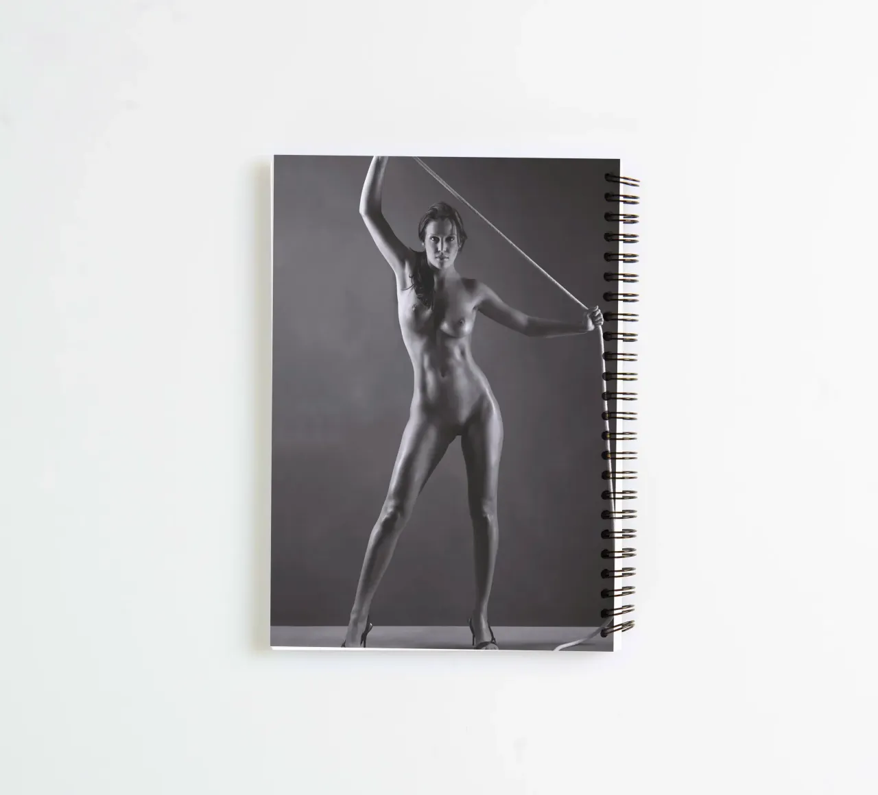 Laura with a rope spiral notebook by Dave Hare Photography