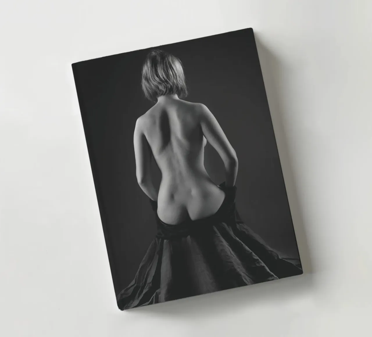 Mina seated notebook by Dave Hare Photography