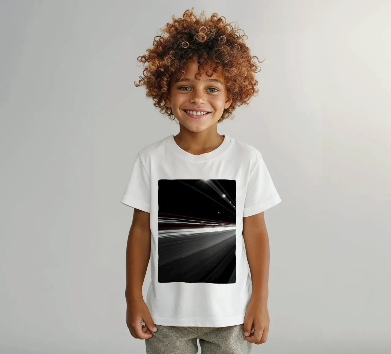 Dynamic lights create streaks on a busy city road kids t-shirt by DesignDoodle