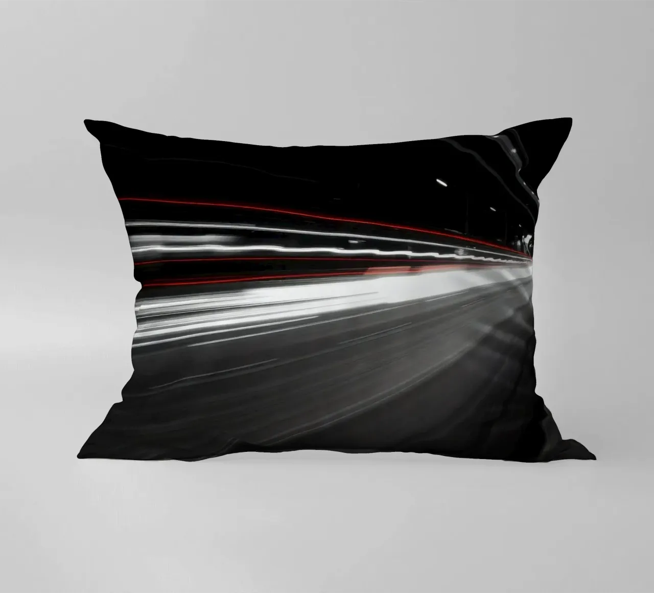 Dynamic lights create streaks on a busy city road decorative cushion by DesignDoodle