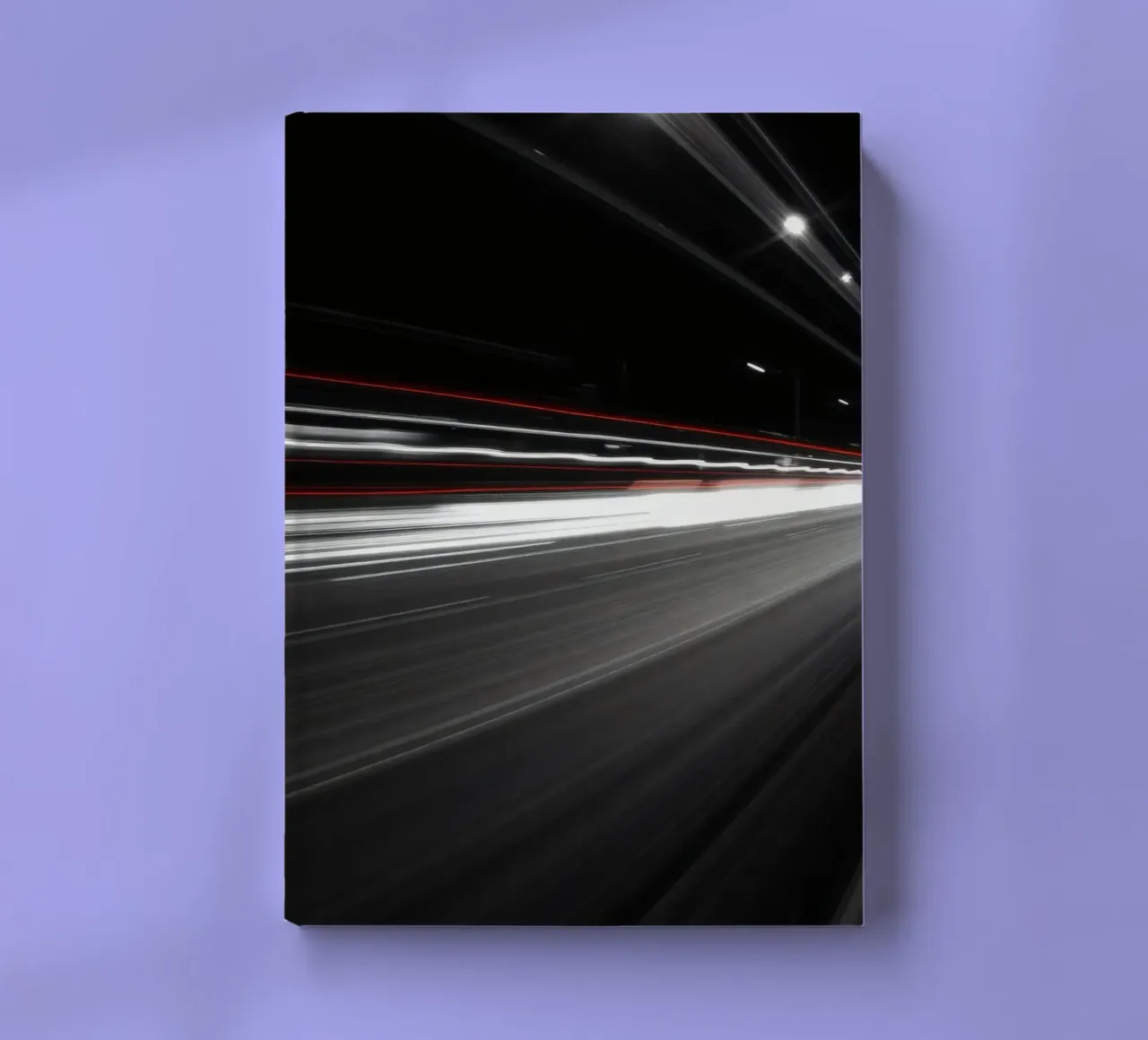 Dynamic lights create streaks on a busy city road notebook by DesignDoodle