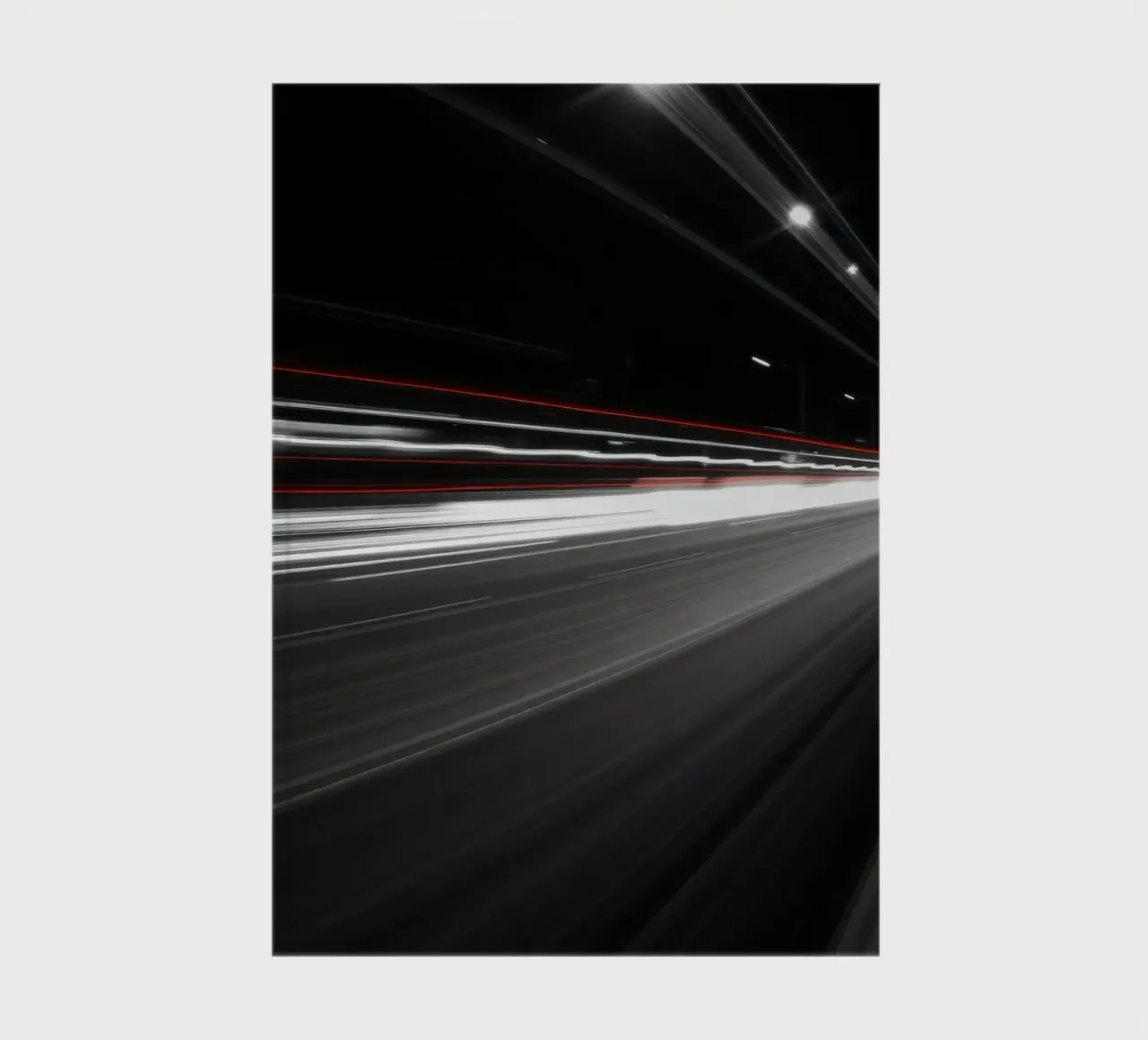 Dynamic lights create streaks on a busy city road notebook by DesignDoodle