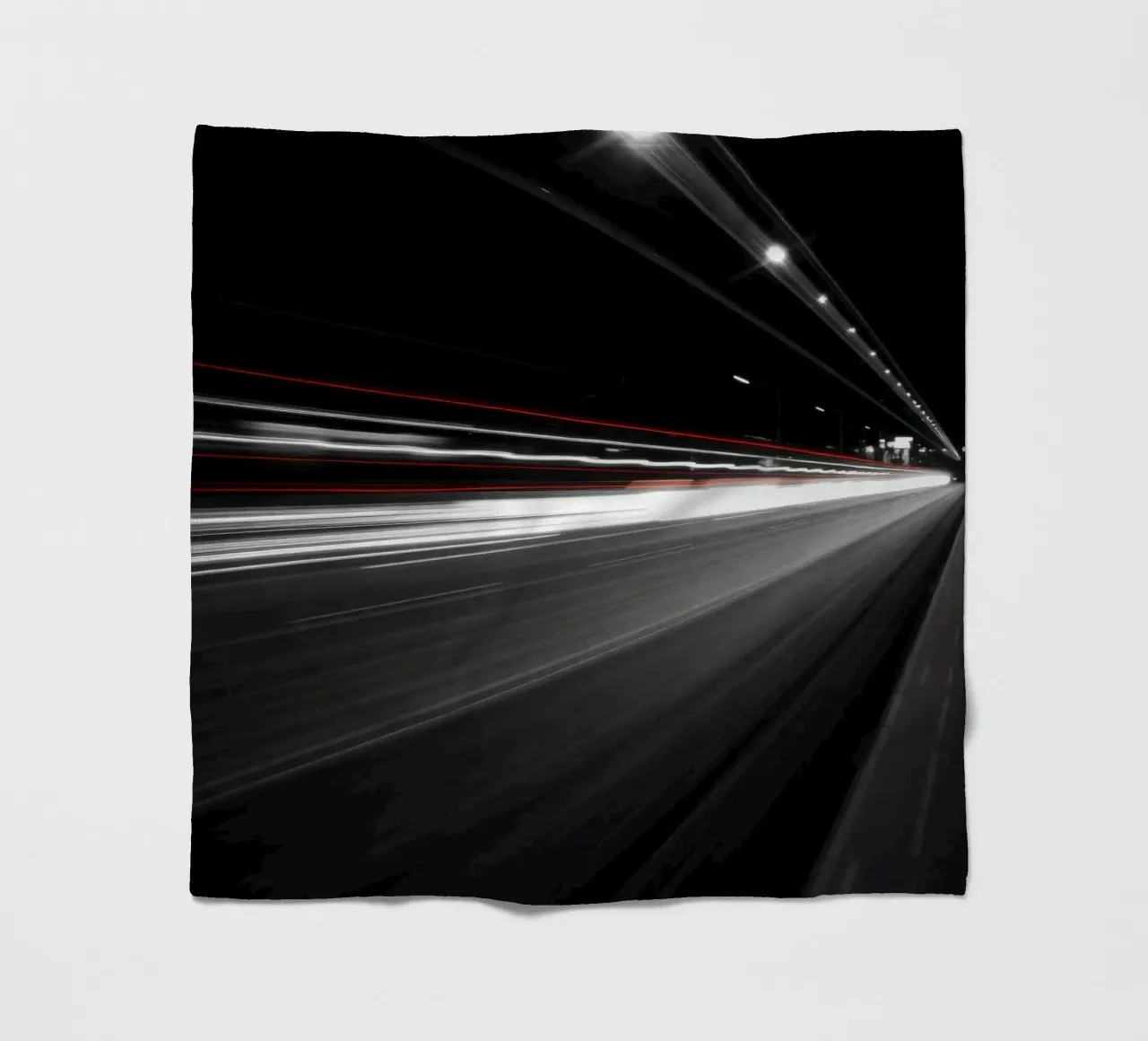 Dynamic lights create streaks on a busy city road fleece blanket by DesignDoodle