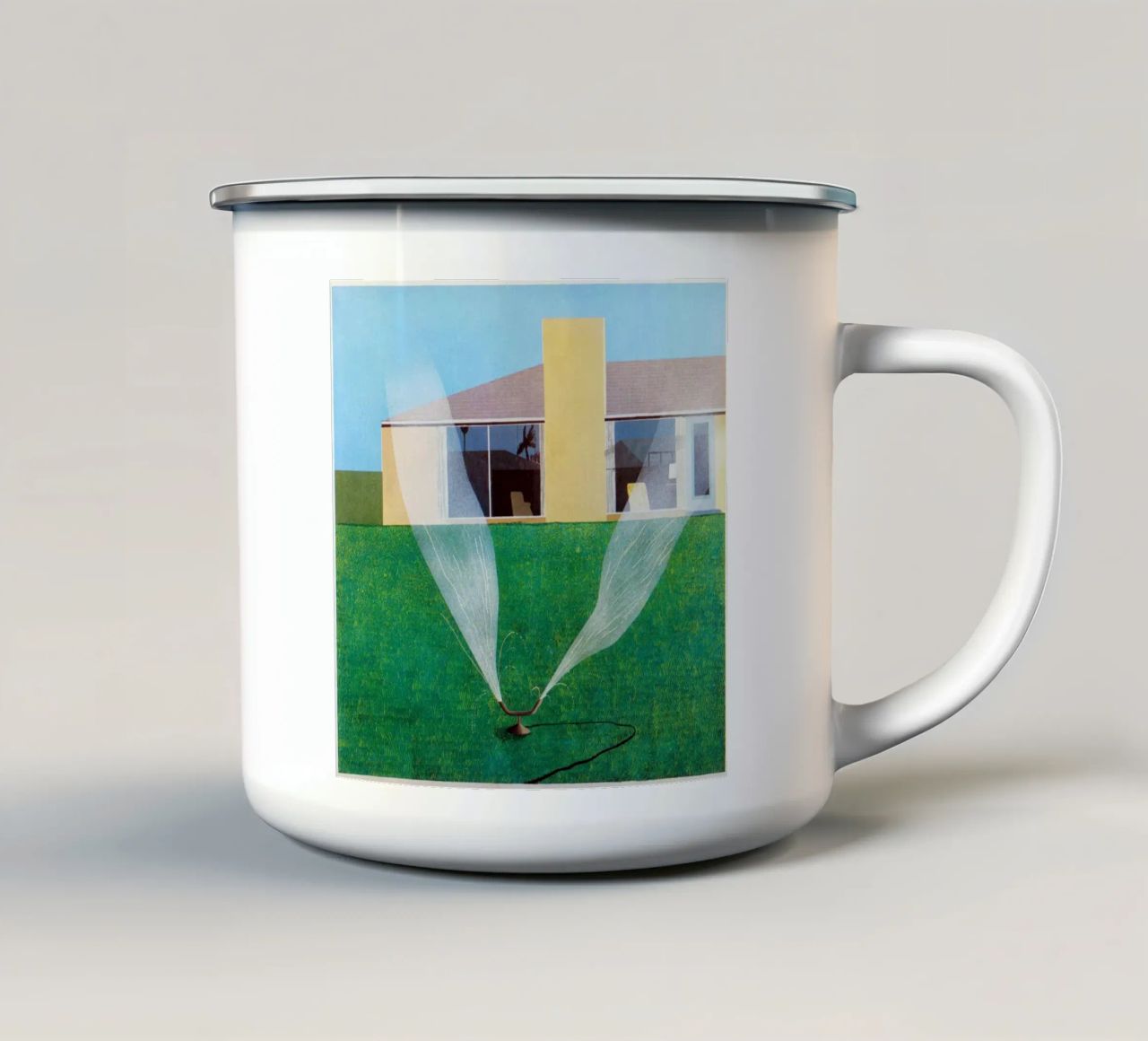 Un irrigatore per prato tazza in smalto da khanrosie