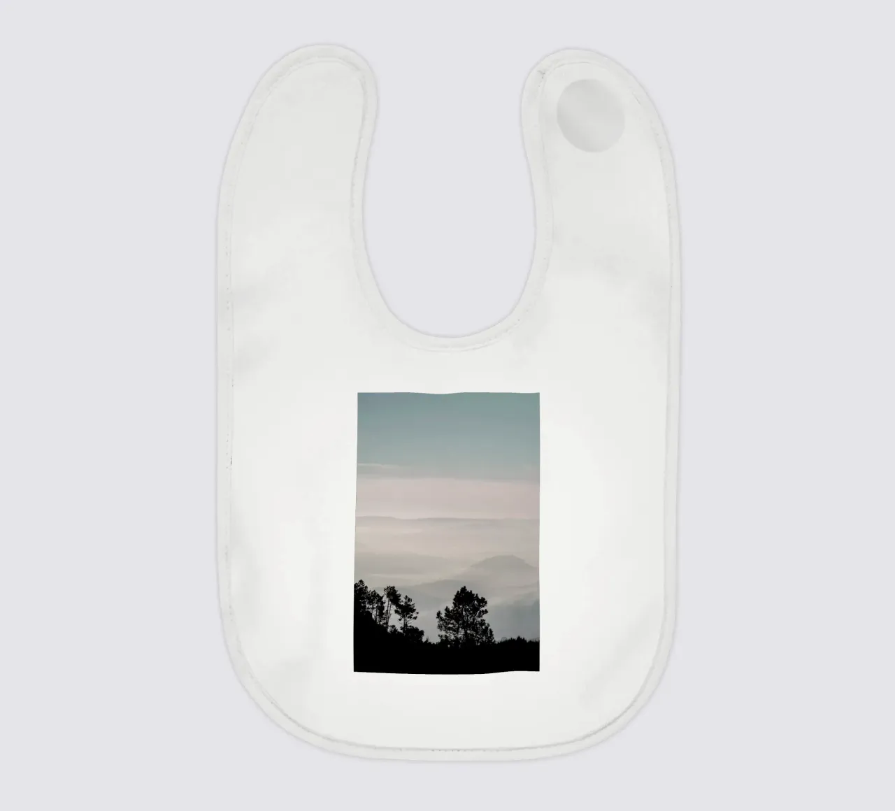 Mountain Range baby bib by Ingrid Beddoes