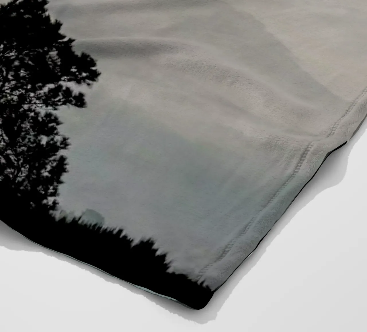 Mountain Range fleece blanket by Ingrid Beddoes