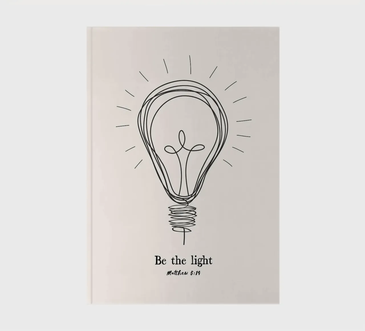 light bulb cross religious theme inspiration notebook by James Isaac Jackson