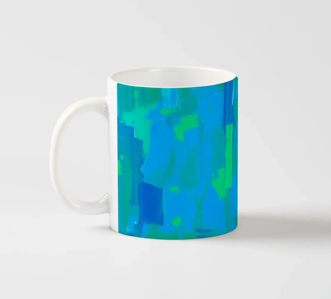 abstract painting with shades of blue and green ceramic mug by DesignDoodle