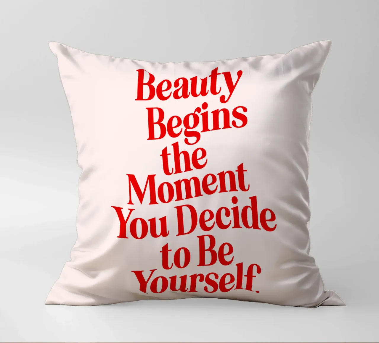 La bellezza inizia nel momento in cui si decide di essere se stessi cuscino da THE MOTIVATED TYPE