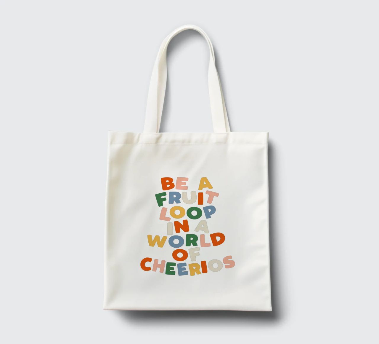 Be a Fruitloop in a World of Cheerios Typography Print tote bag by THE MOTIVATED TYPE