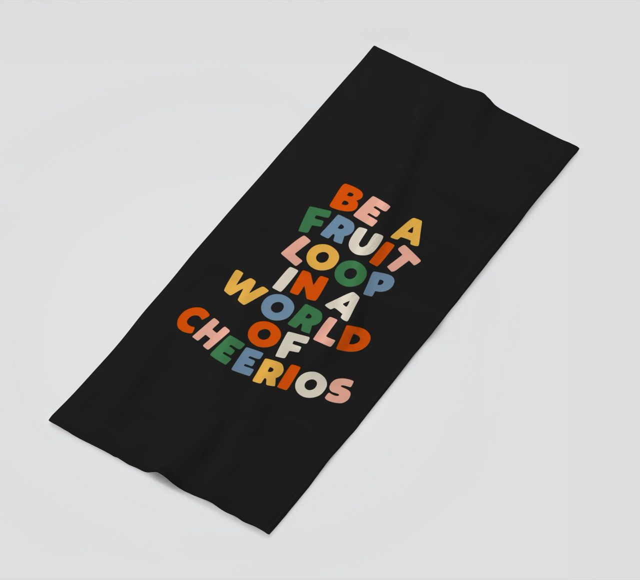 Be a Fruitloop in a World of Cheerios Typography Print beach towel by THE MOTIVATED TYPE