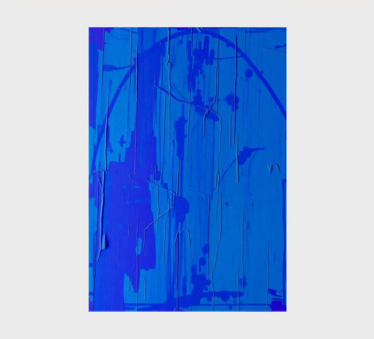 Abstract blue artwork featuring textured surface and varying notebook by DesignDoodle