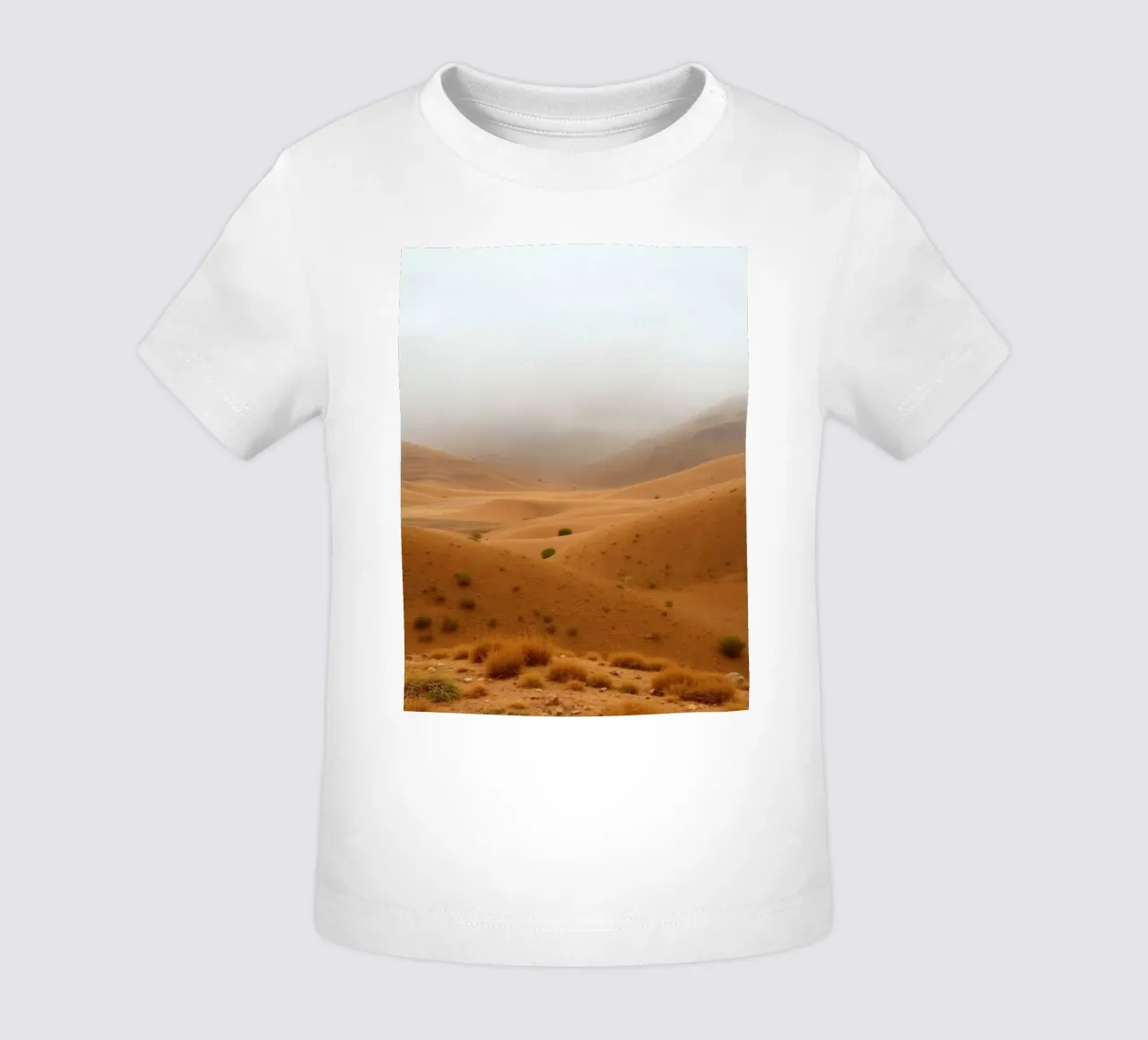 desert landscape under cloudy sky with gentle rolling dunes baby t-shirt by DesignDoodle