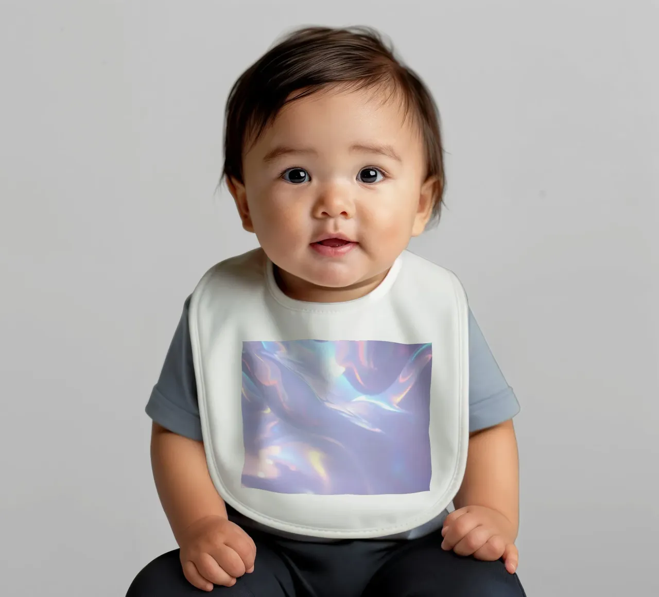 surface reflecting soft colors and patterns baby bib by DesignDoodle