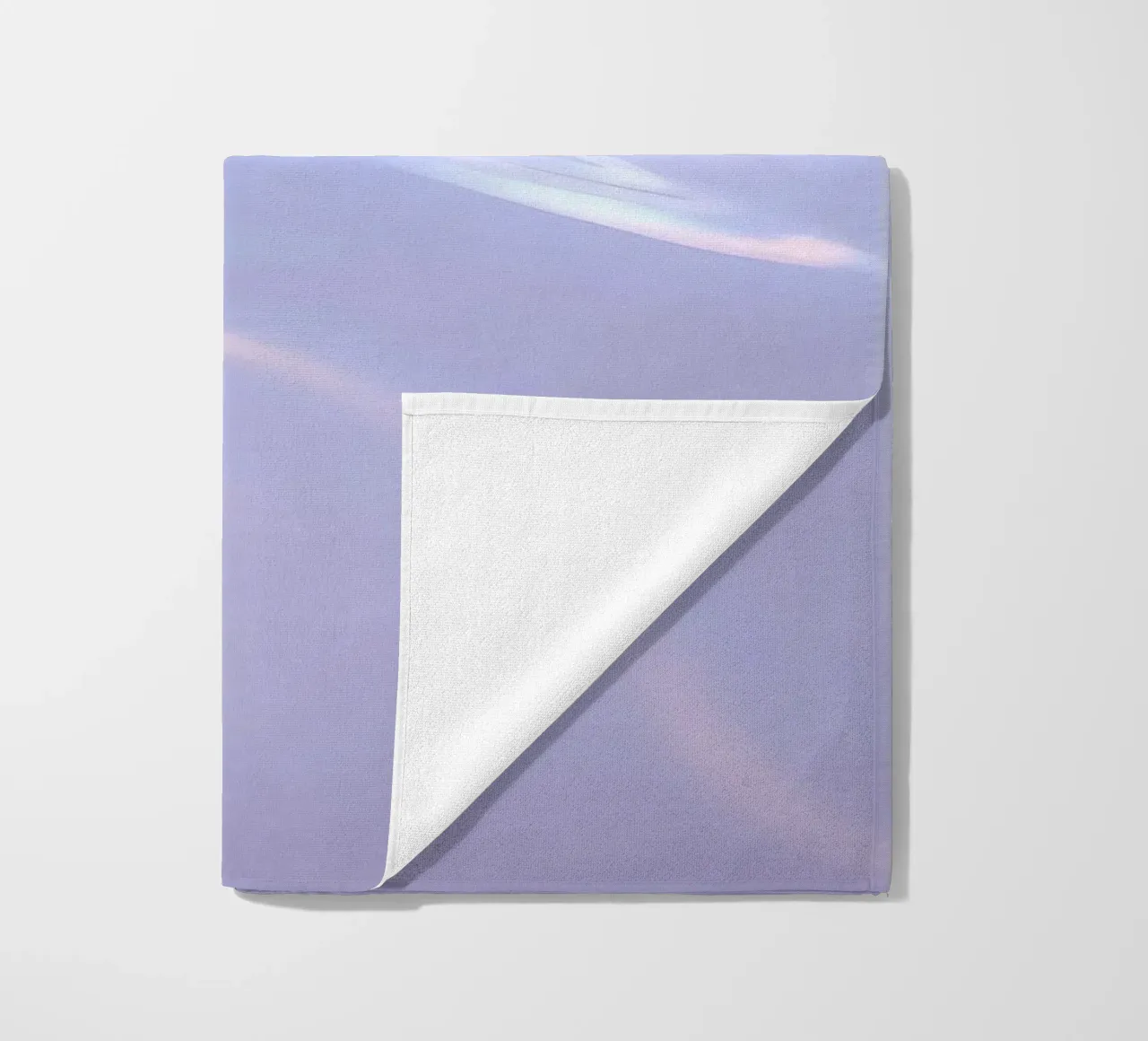 surface reflecting soft colors and patterns beach towel by DesignDoodle