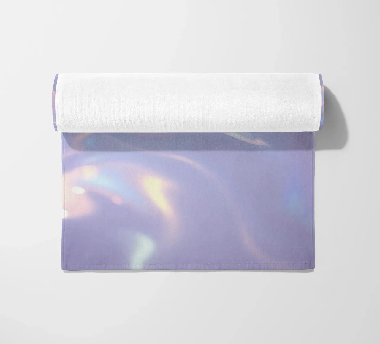surface reflecting soft colors and patterns beach towel by DesignDoodle