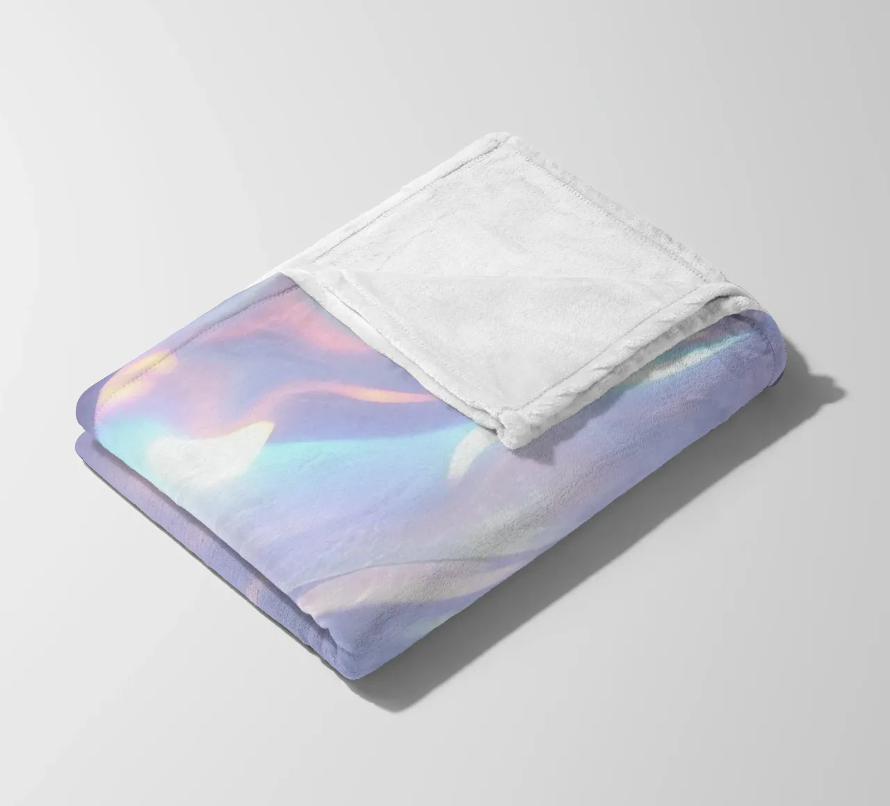 surface reflecting soft colors and patterns fleece blanket by DesignDoodle
