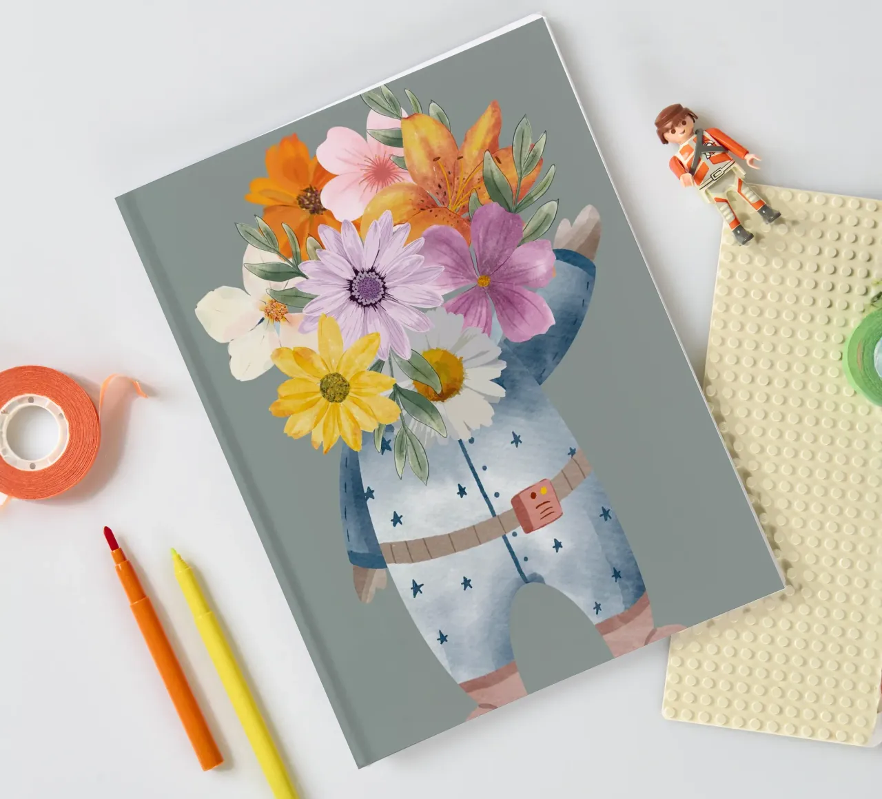 Flowers and astronaut notebook by LisaArtes