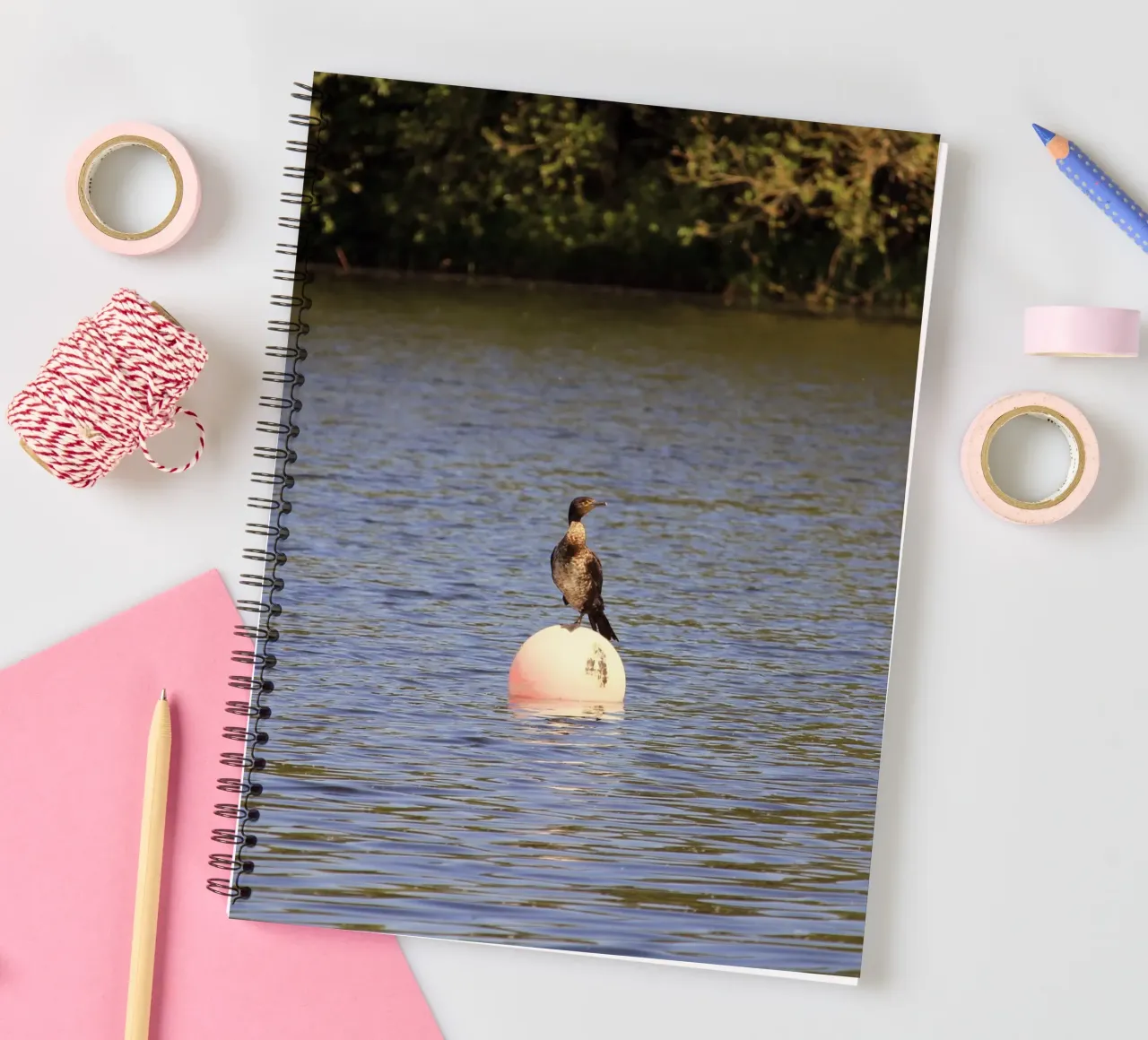 Cormorant Perched on a Buoy in the Lake spiral notebook by Jack C Photography