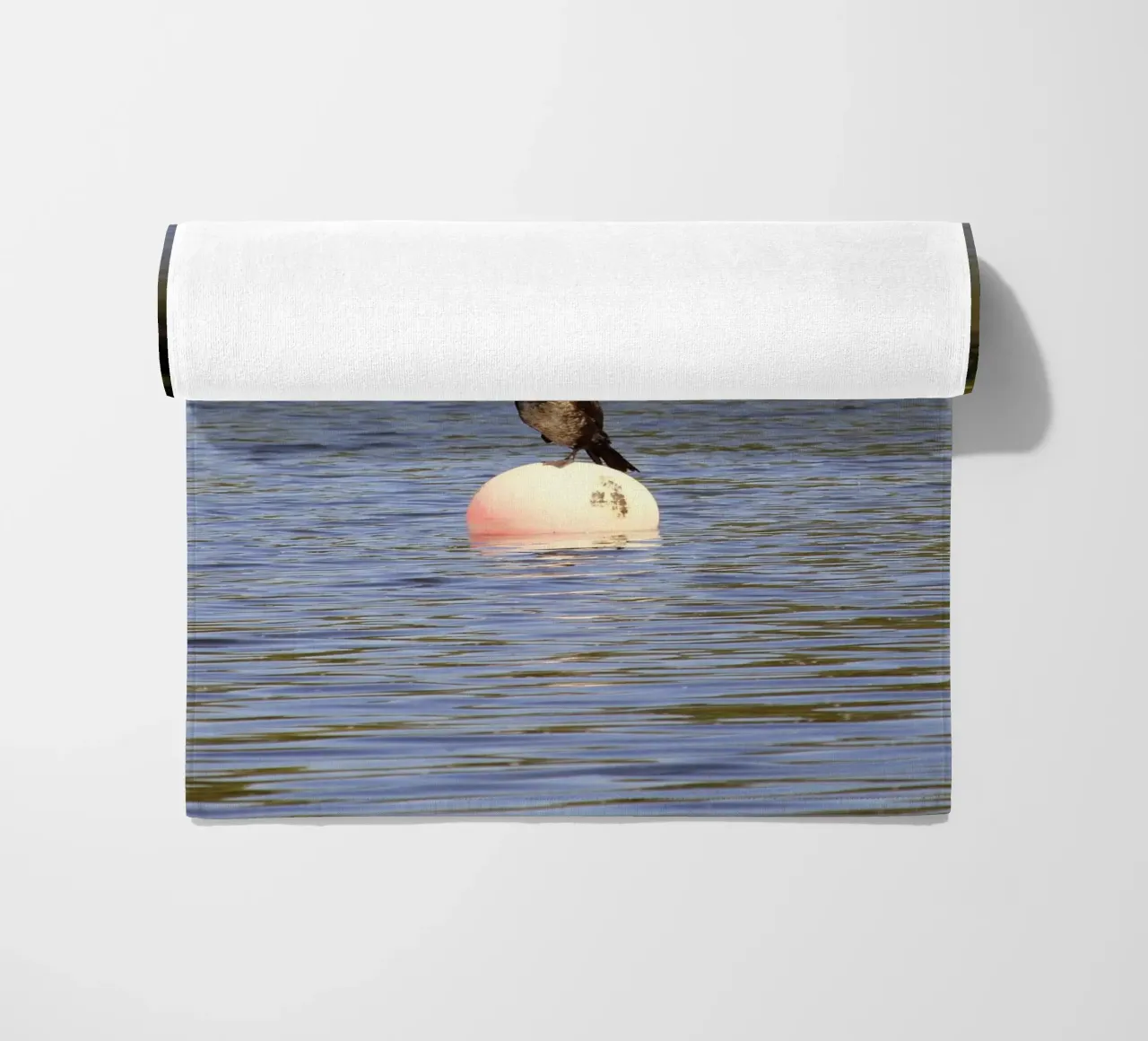Cormorant Perched on a Buoy in the Lake beach towel by Jack C Photography