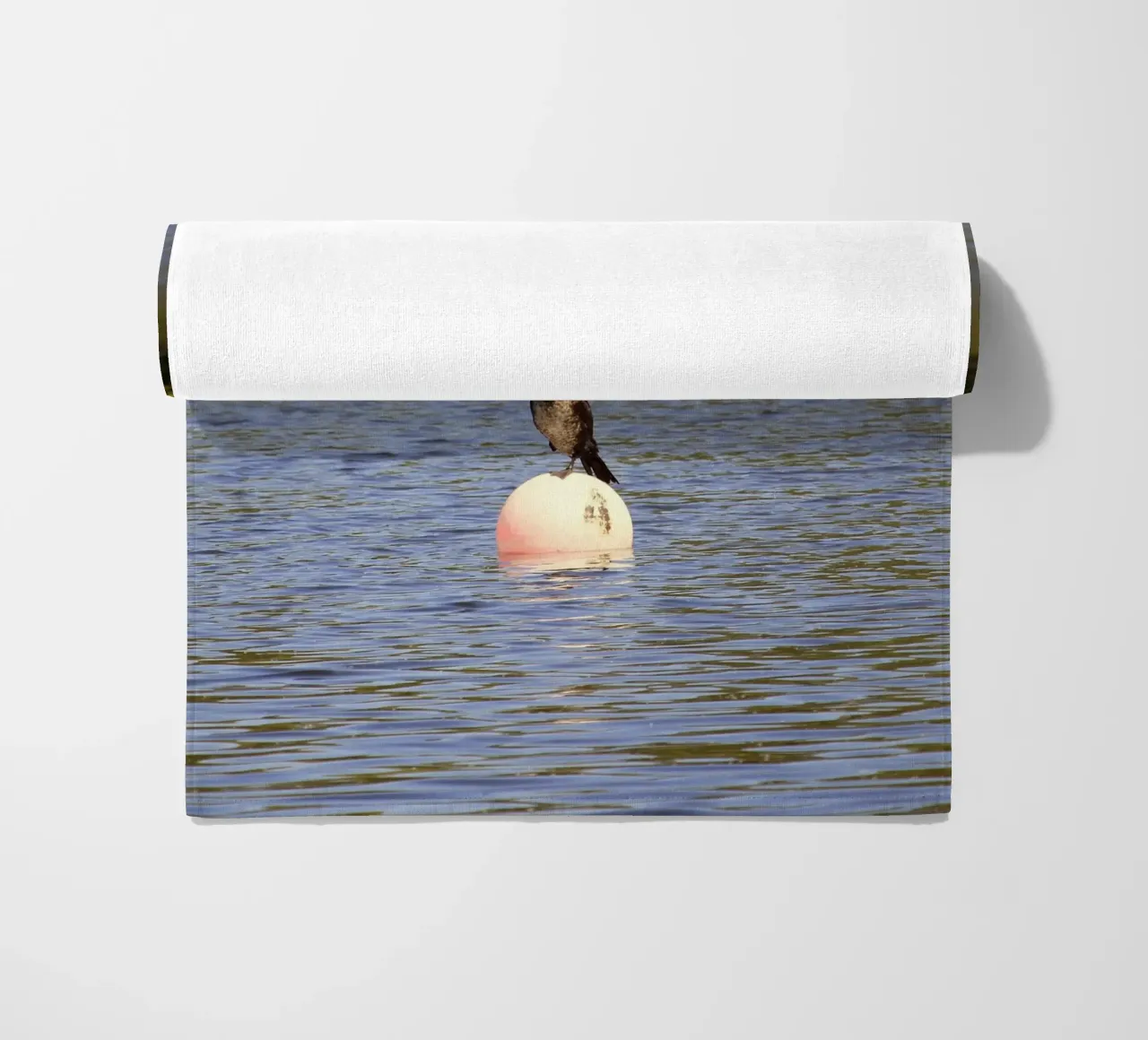 Cormorant Perched on a Buoy in the Lake beach towel by Jack C Photography