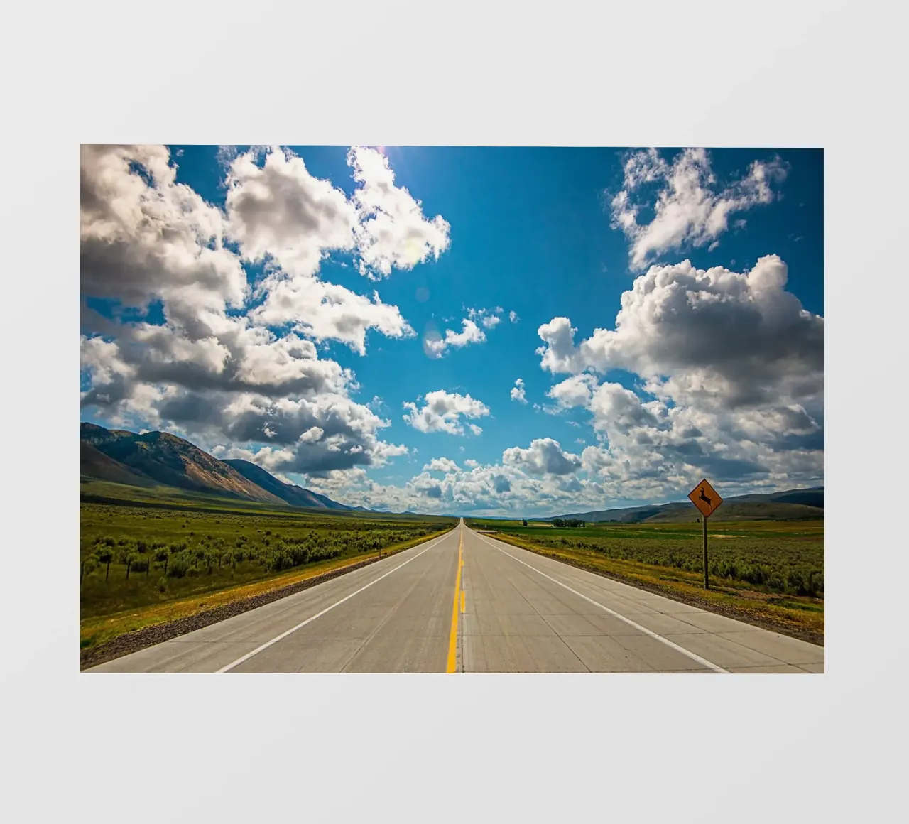 highway open road road sign clouds mountains landscape backlit film by Kirsten C Nolan