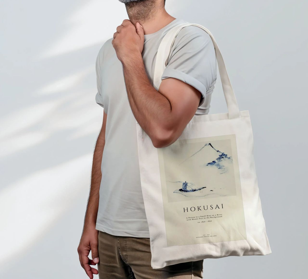 Hokusai - A Person in a Small Boat on a River with Mount Fuji in the Background II tote bag by Vintage by JUNIQE