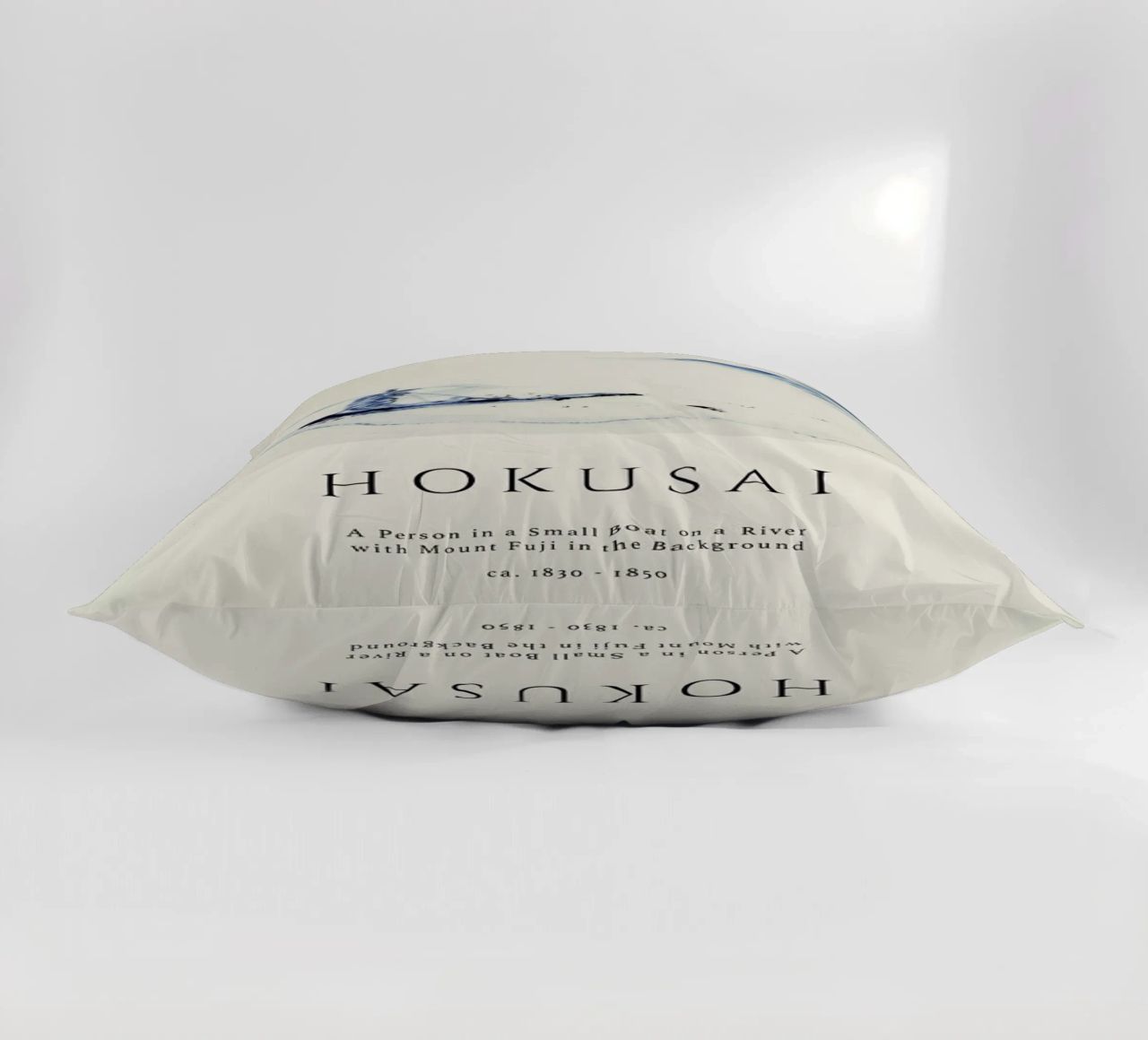 Hokusai - A Person in a Small Boat on a River with Mount Fuji in the Background II decorative cushion by Vintage by JUNIQE