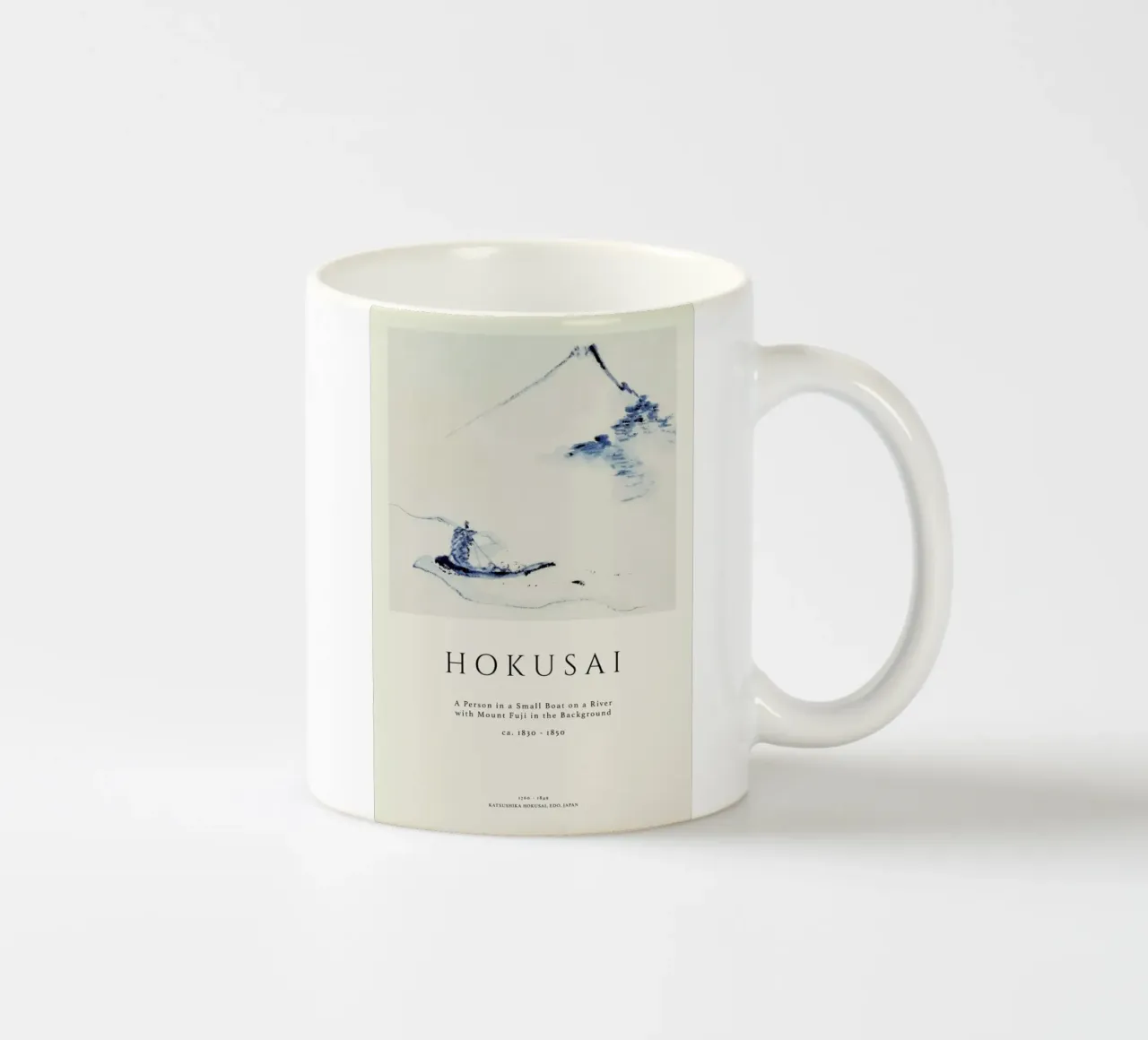 Hokusai - A Person in a Small Boat on a River with Mount Fuji in the Background II ceramic mug by Vintage by JUNIQE