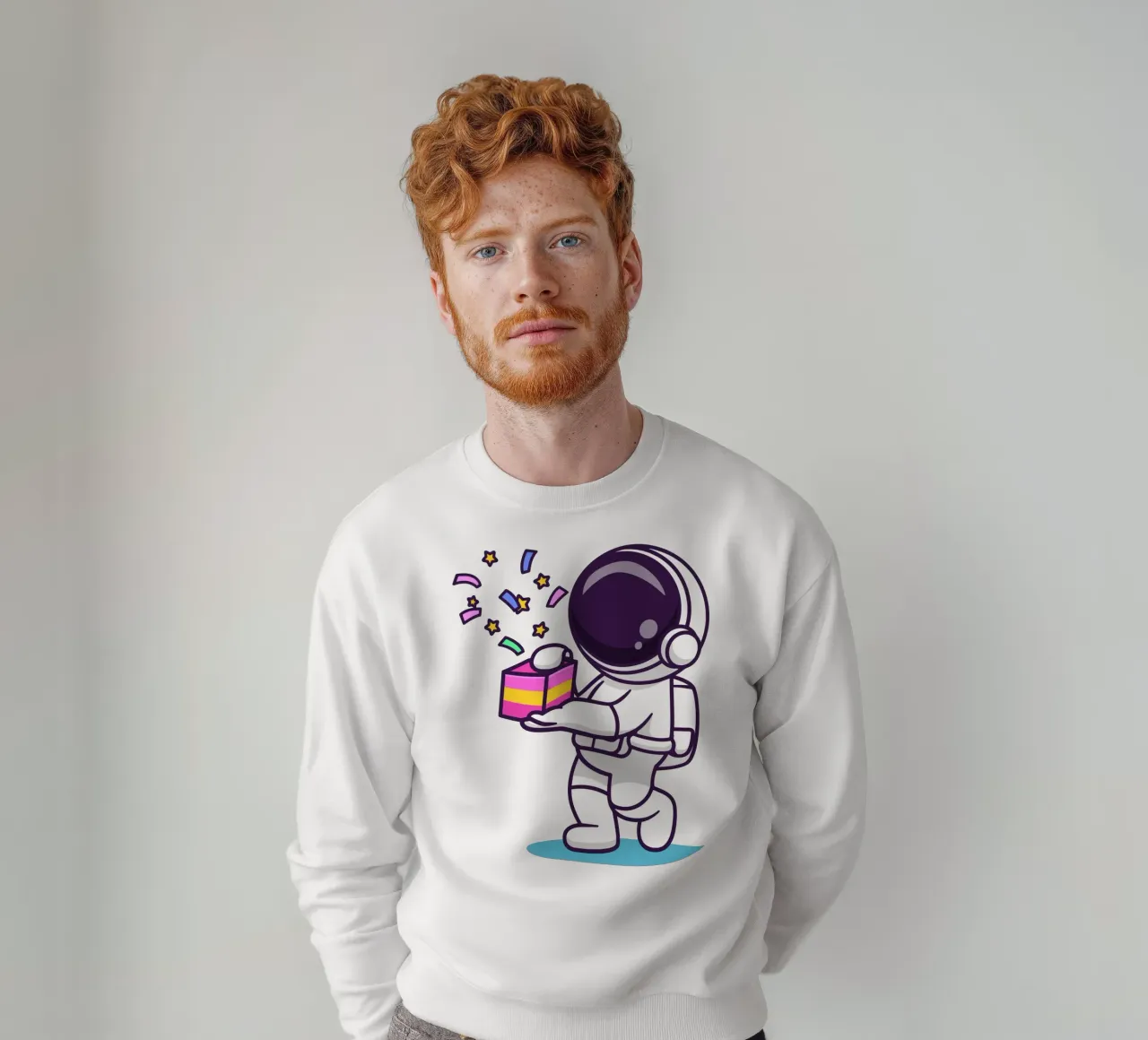 Simpatico astronauta con in mano una confezione regalo felpa da brockcon Shop