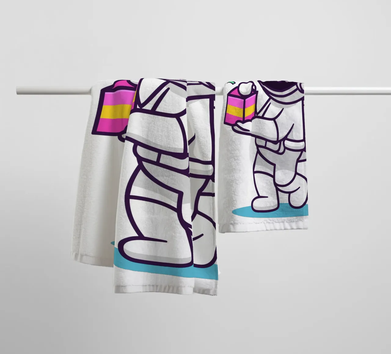 Simpatico astronauta con in mano una confezione regalo asciugamano da bagno da brockcon Shop