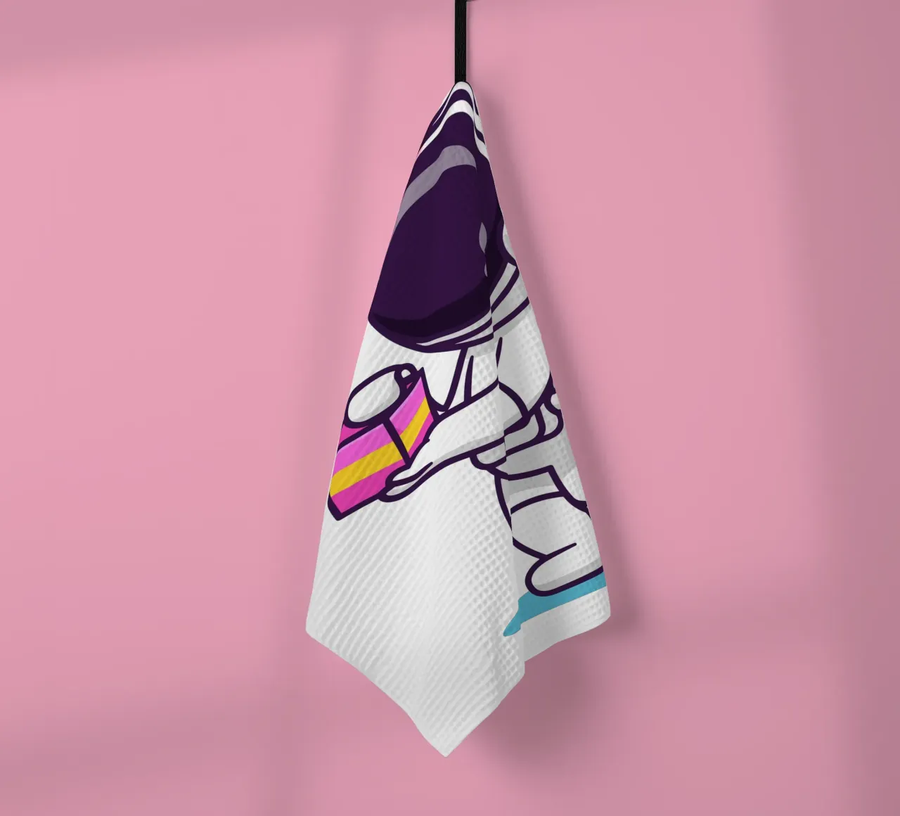 Simpatico astronauta con in mano una confezione regalo canovaccio da cucina da brockcon Shop