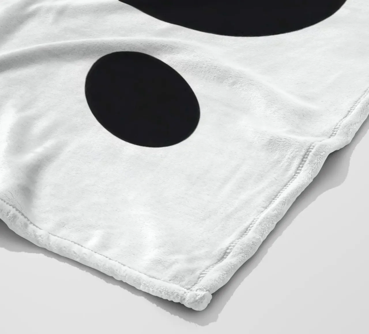 Abstract design featuring black shapes on a white background fleece blanket by DesignDoodle