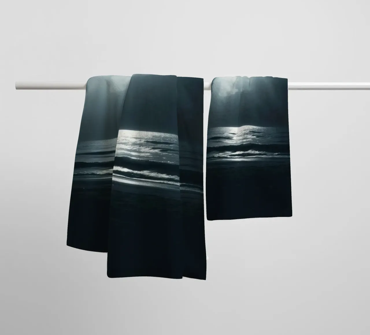 Serene nighttime ocean view illuminated by bright moonlight towel by DesignDoodle