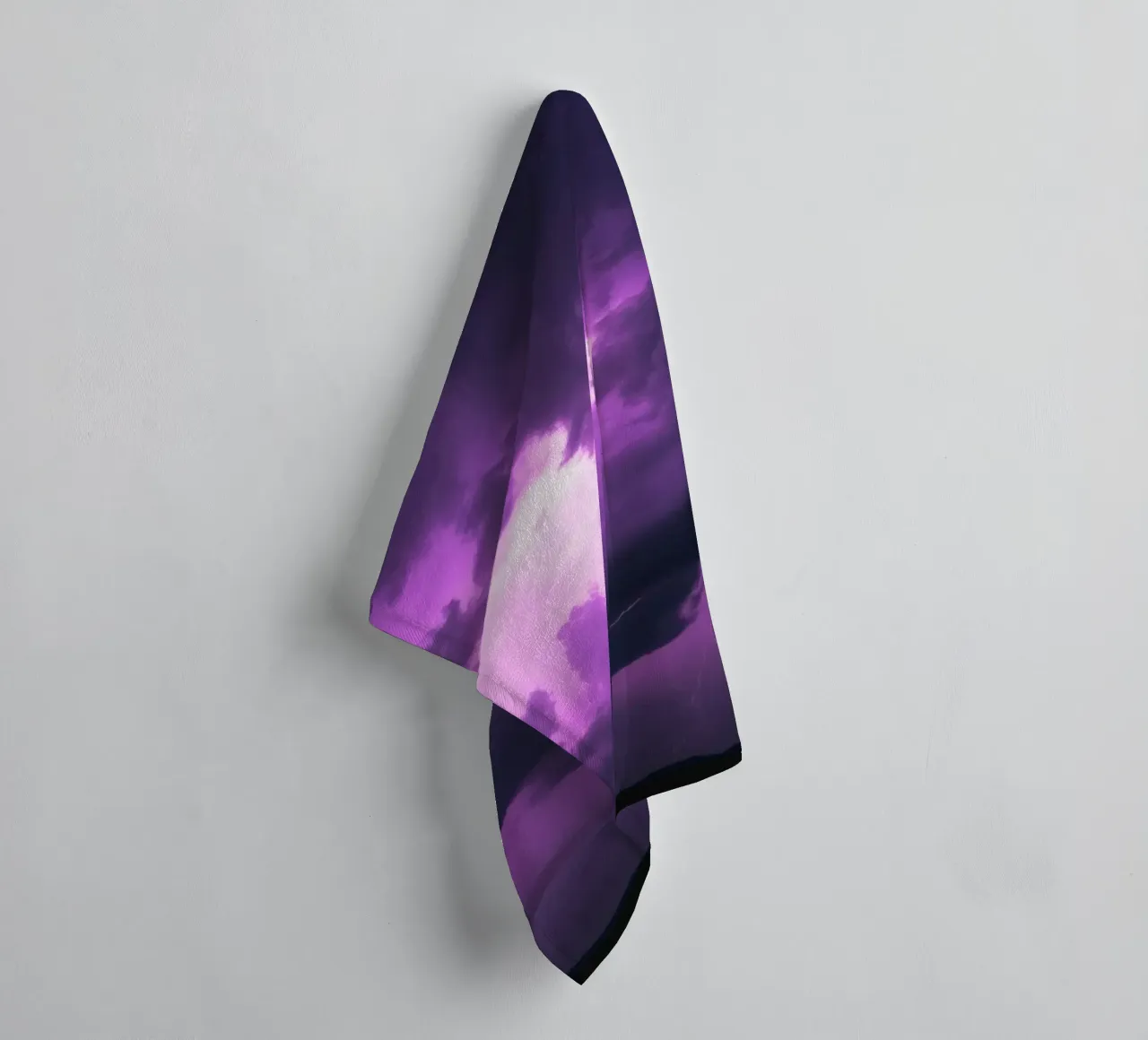Dramatic lightning strikes illuminate a purple stormy sky towel by DesignDoodle