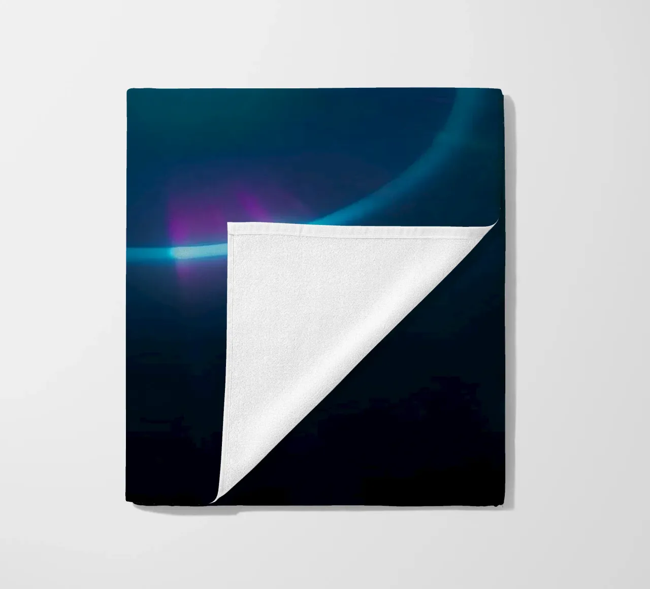 Celestial light display showcasing vibrant colors and patter beach towel by DesignDoodle