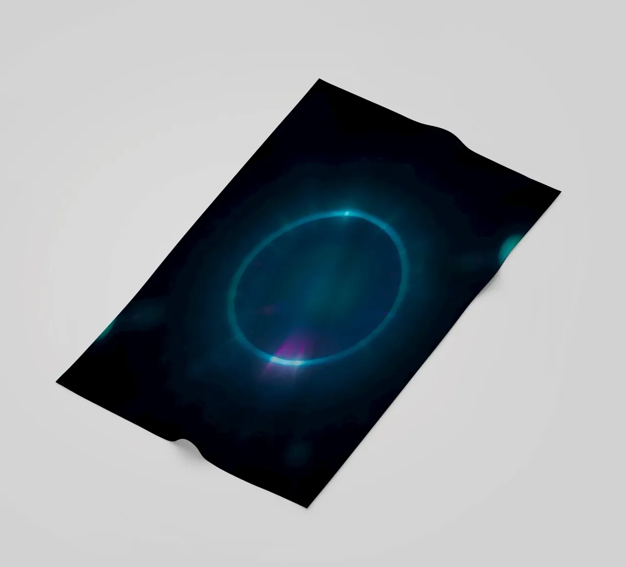 Celestial light display showcasing vibrant colors and patter beach towel by DesignDoodle