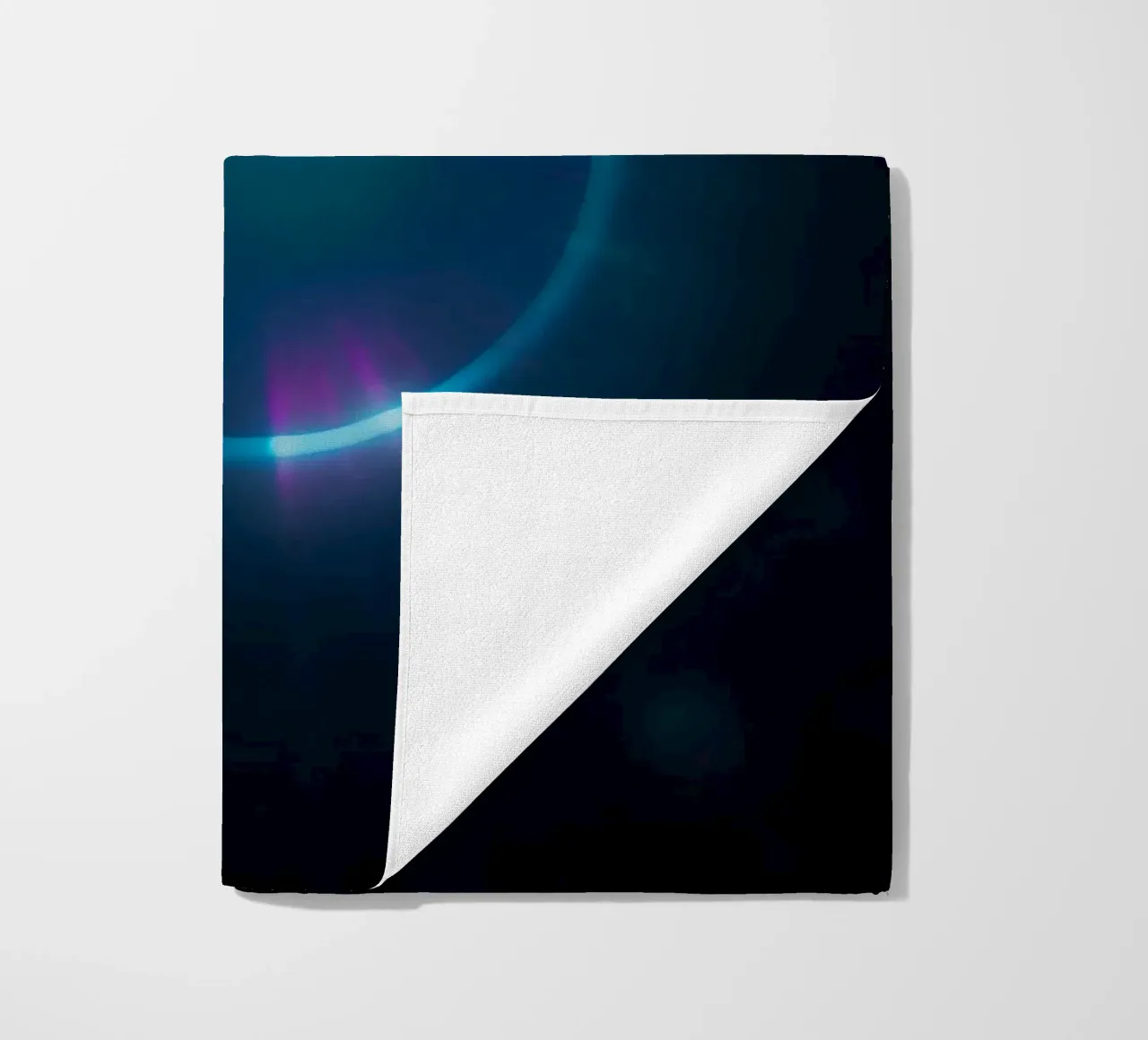 Celestial light display showcasing vibrant colors and patter beach towel by DesignDoodle