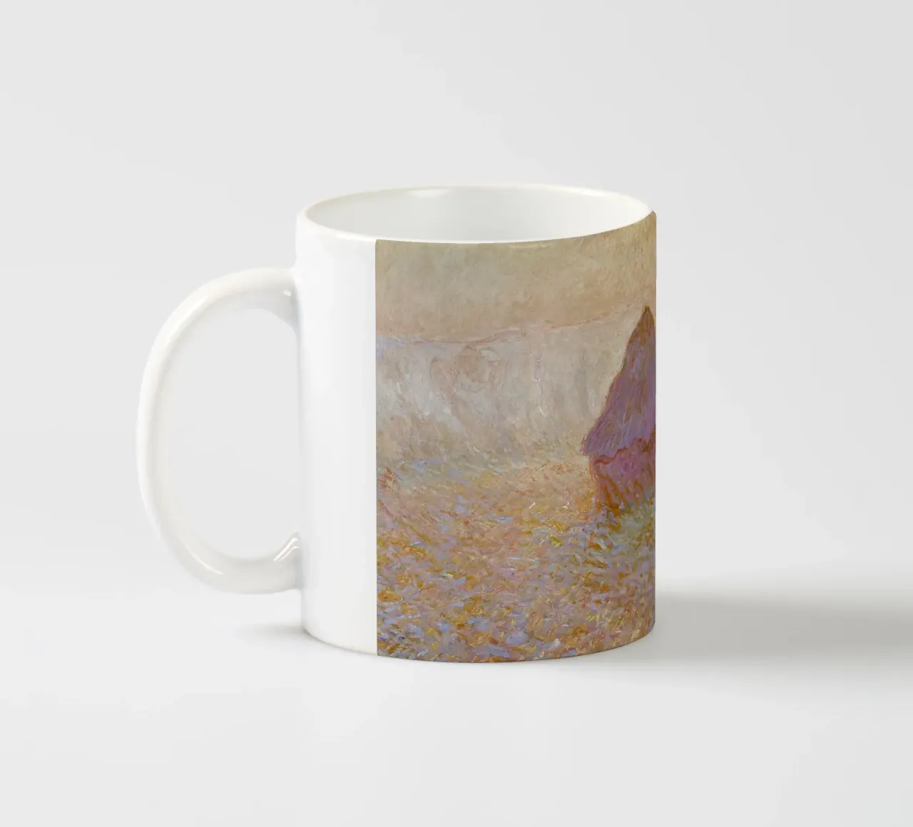 Il mucchio di grano di Claude Monet, Sole nella nebbia (1891) tazza in ceramica da Monet Art Prints