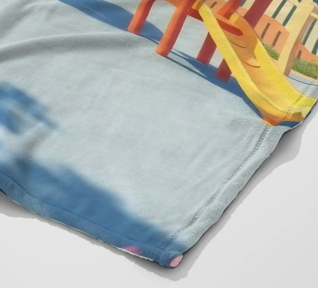 playground filled with colorful slides and play structures fleece blanket by DesignDoodle