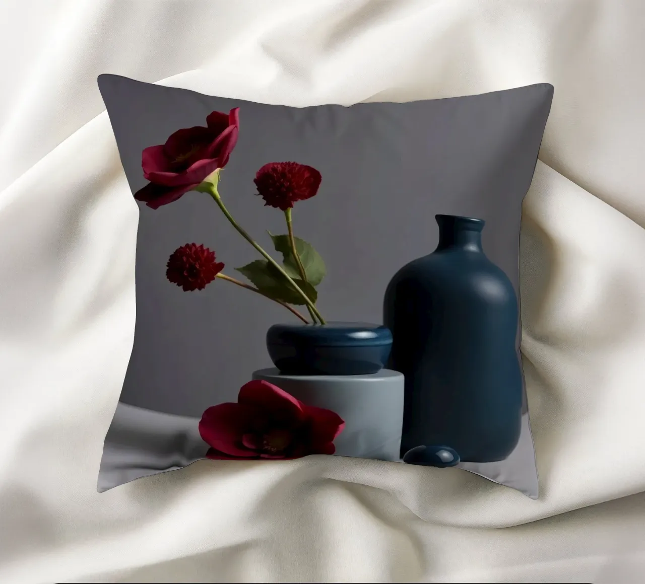 vasi blu scuro con fiori vivaci su un tavolo minimalista cuscino da DesignDoodle