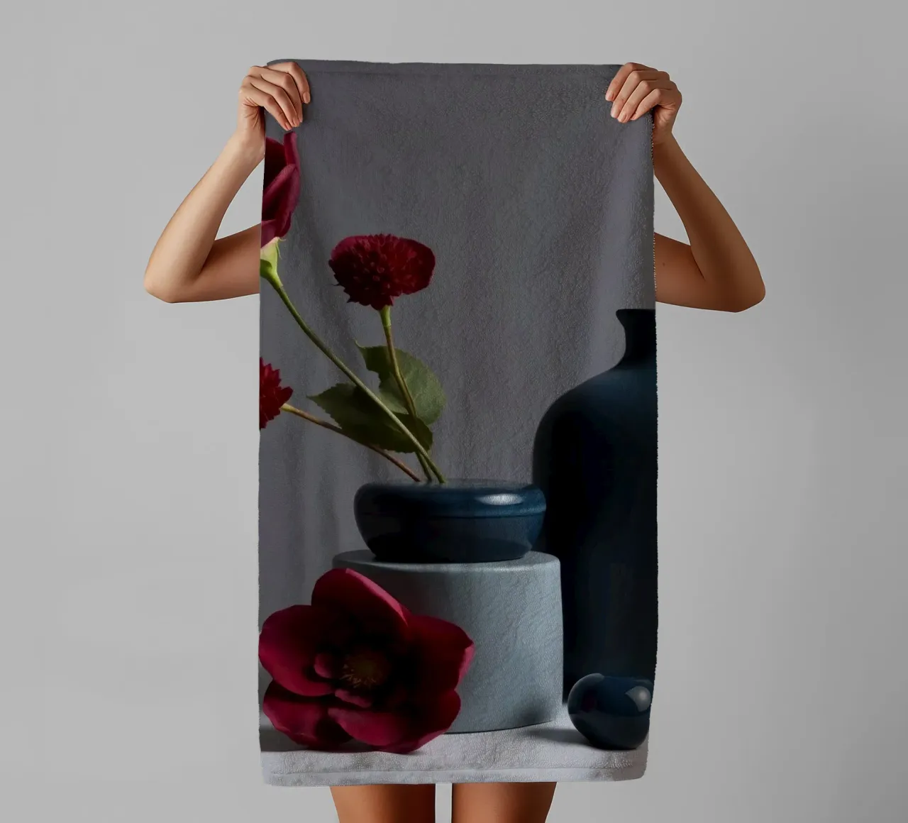 dark blue vases with vibrant flowers on a minimalist table towel by DesignDoodle