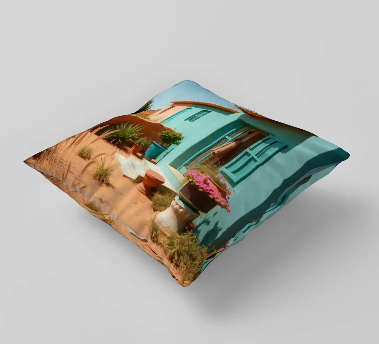 Casa dai colori vivaci con giardino in un soleggiato paesaggio desertico cuscino da DesignDoodle