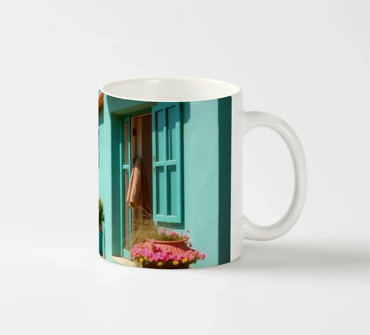 Casa dai colori vivaci con giardino in un soleggiato paesaggio desertico tazza in ceramica da DesignDoodle