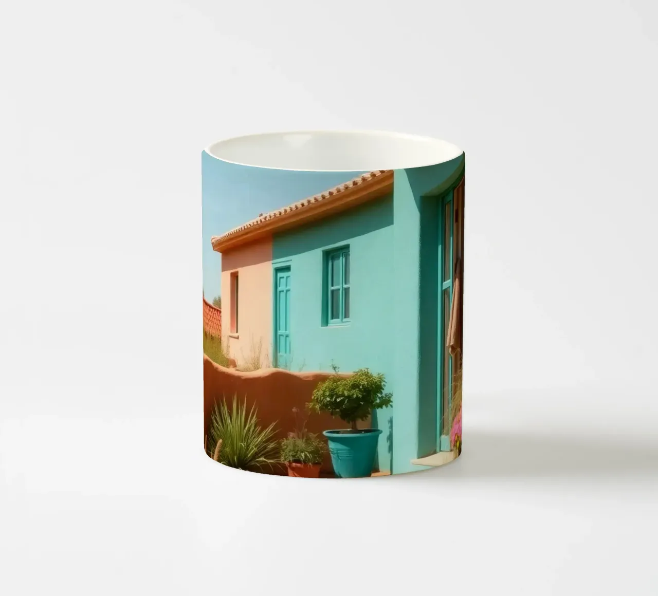 Casa dai colori vivaci con giardino in un soleggiato paesaggio desertico tazza in ceramica da DesignDoodle
