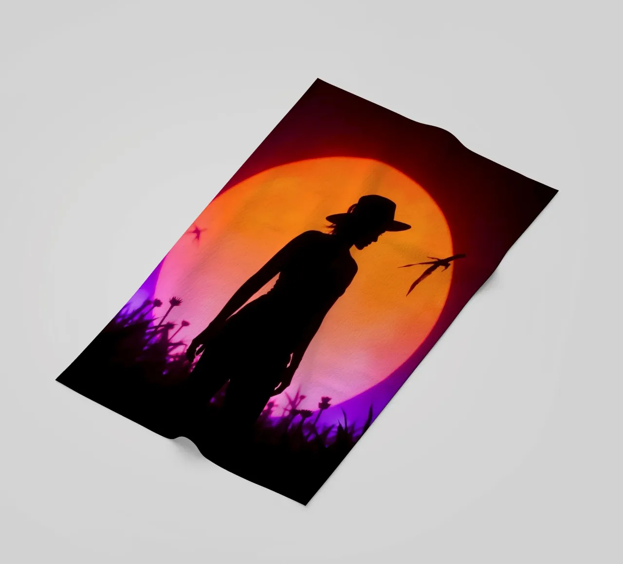 Silhouette of a woman in a hat, sunset with flying insects beach towel by DesignDoodle
