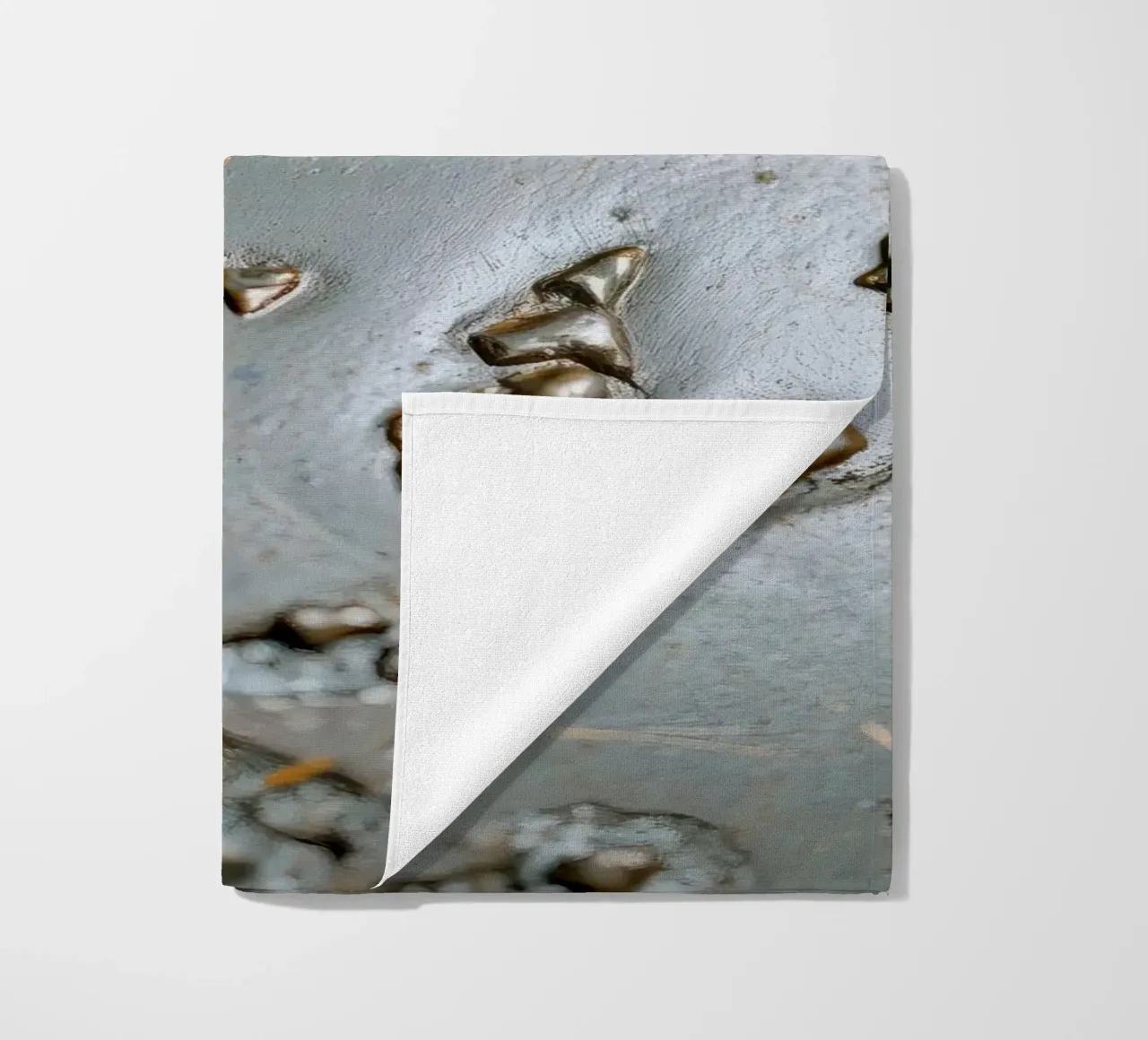 textured metal surface showcasing rust and corrosion pattern beach towel by DesignDoodle